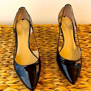Black patent leather pumps size 10M. Never worn